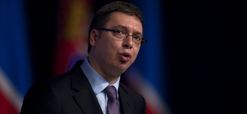 Aleksandar Vucic, the leader of the Serbian Progressive Party, talks at a pre-election rally in Belgrade, Serbia, Tuesday, March 11, 2014. Vucic's Serbian Progressive Party is considered a favorite to win the majority of votes at the country's parliamentary elections, set for Sunday, March 16, 2014. (AP Photo/Marko Drobnjakovic)