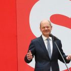 Social Democratic candidate for chancellor Olaf Scholz speaks at the party's headquarters in Berlin, Monday, Sept. 27, 2021. Following Sunday's election leaders of the German parties were meeting Monday to digest a result that saw Merkel’s Union bloc slump to its worst-ever result in a national election and appeared to put the keys to power in the hands of two opposition parties. Both Social Democrat Olaf Scholz and Armin Laschet, the candidate of Merkel's party, laid a claim to leading the next government. (Wolfgang Kumm/dpa via AP)