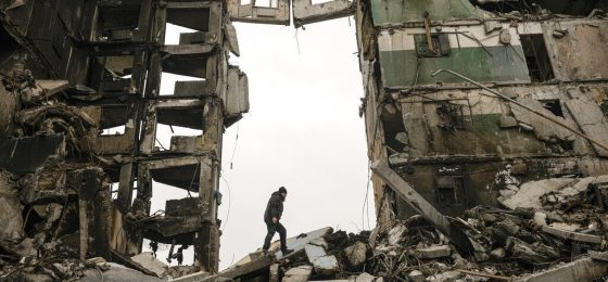 FILE - A resident looks for belongings in an apartment building destroyed during fighting between Ukrainian and Russian forces in Borodyanka, Ukraine, on April 5, 2022. Many Americans continue to question whether President Joe Biden is showing enough strength in response to Russia’s war against Ukraine, even as most approve of steps the U.S. is already taking and few want U.S. troops to get involved in the conflict. (AP Photo/Vadim Ghirda, File)